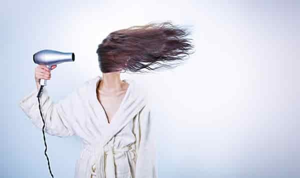 hairdryer in face