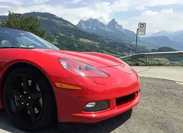 red convertible corvette scenery