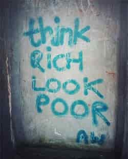 think rich look poor